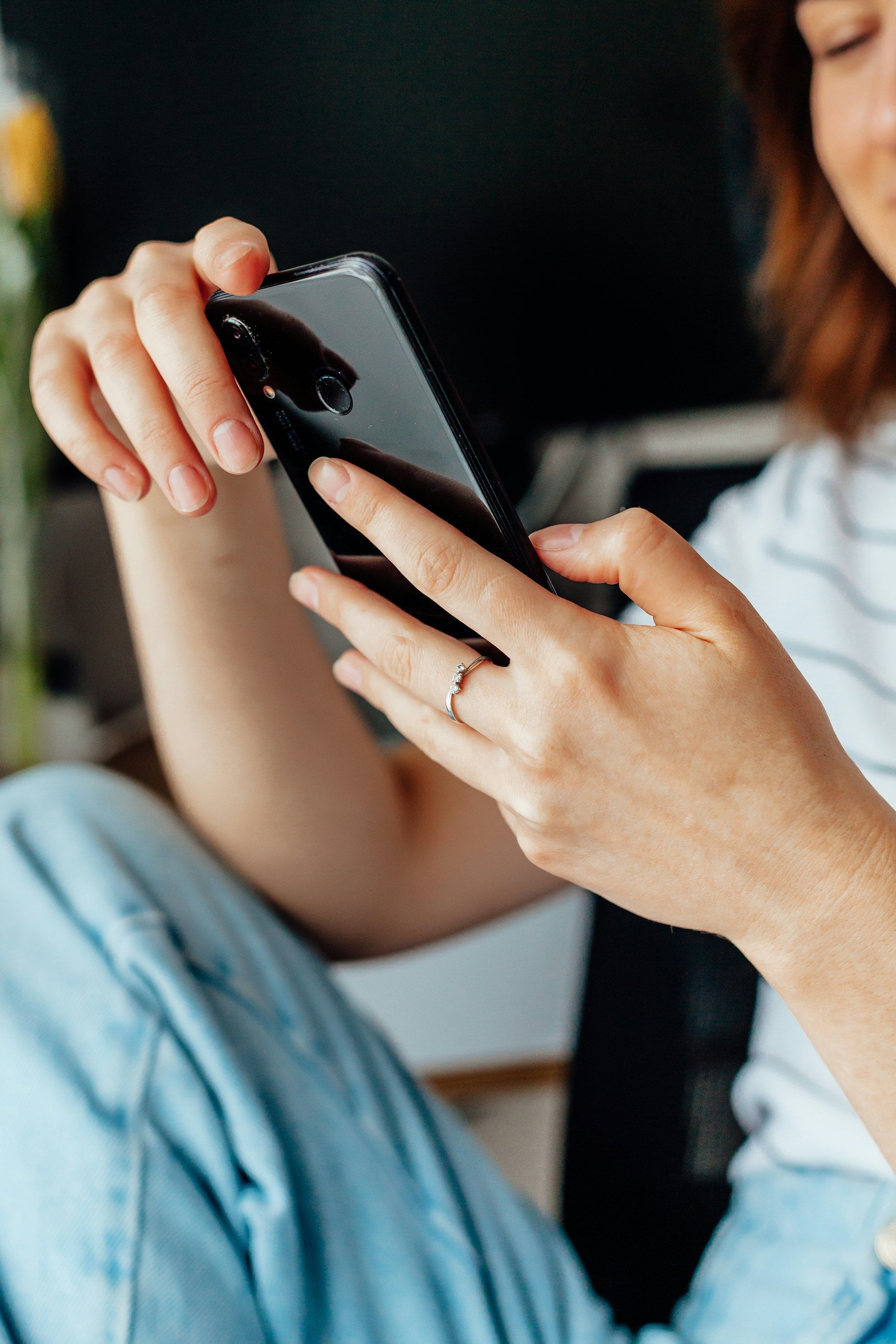 Close-up of hands holding a smartphone